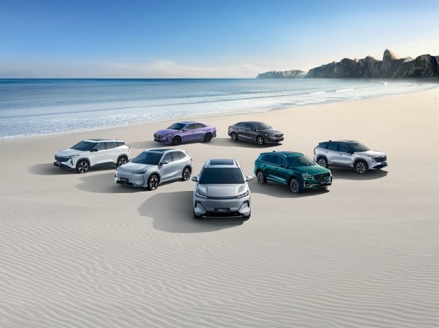 Official Geely vehicle lineup photographed on a beach