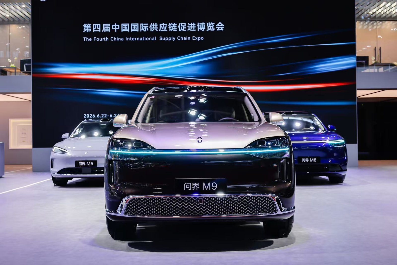 AITO M5, M8 and M9 vehicles displayed at an official Seres supply-chain event