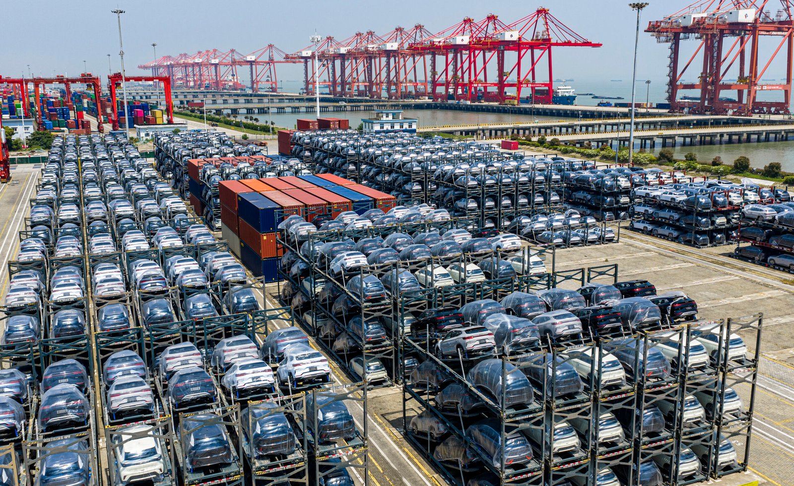 Rows of new energy vehicles at Taicang port awaiting export in May 2026