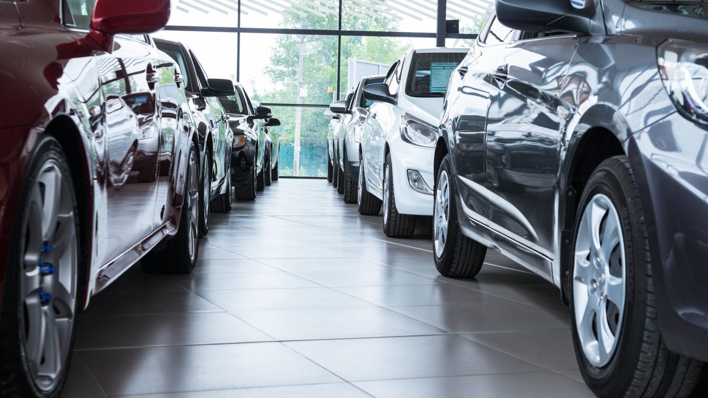 New cars in a UK showroom representing June 2026 registration data