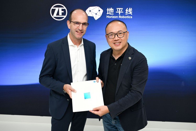 ZF and Horizon Robotics representatives announcing an ADAS collaboration for China